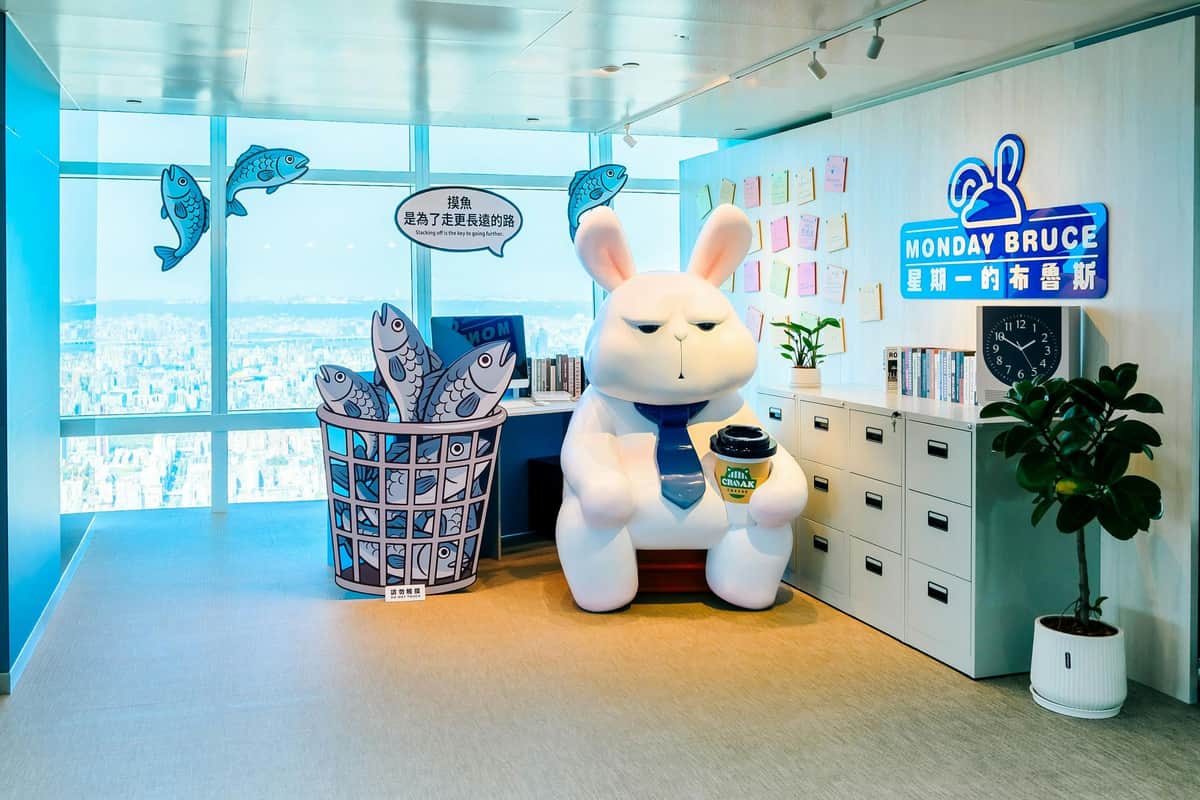 Taipei 101 Observatory: Fast-Track Entry + 89F Ticket A whimsical office-themed display with cartoon-like sculptures, stacks of colorful files, and playful decor in a bright room.