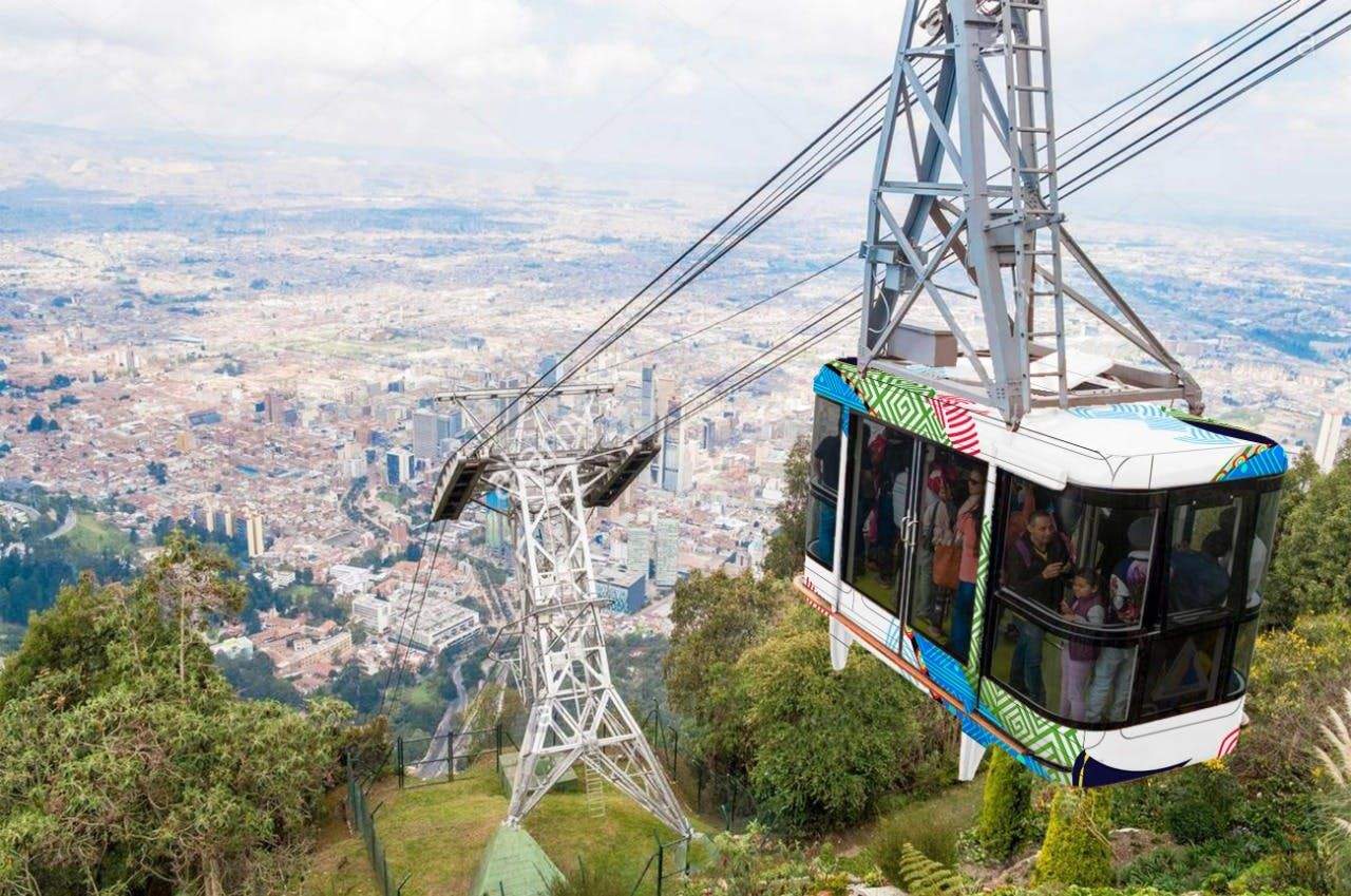 Teleférico de Monserrate Colorful cable car ascending over a dense cityscape, with passengers inside and lush greenery below.